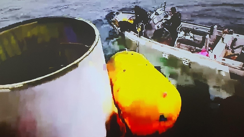 Images released by the South Korean military showed parts of the debris from the North Korean rocket