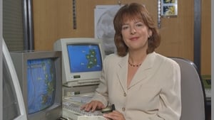 Meteorologist and RTÉ Weather presenter Evelyn Cusack sitting at her desk in 1998.