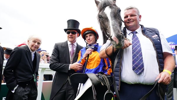 Trainer Aidan O'Brien (second left) and Ryan Moore (second right) celebrate winning The Betfred Derby with Auguste Rodin
