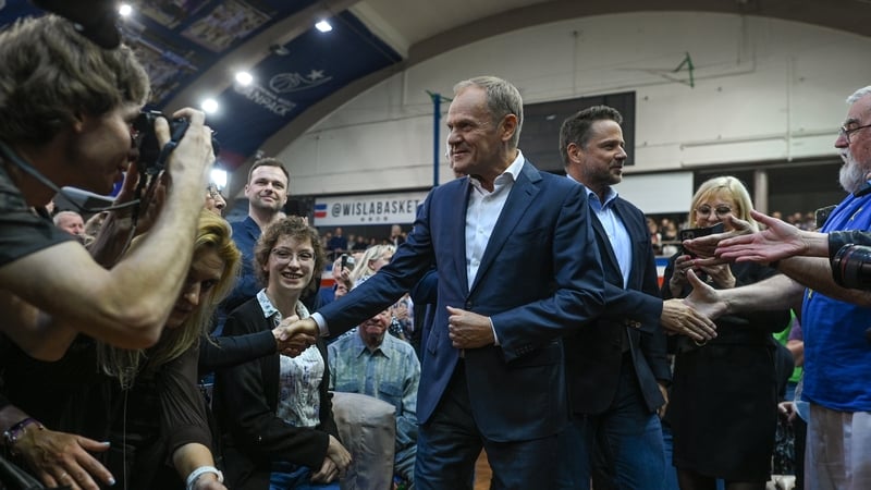 Donald Tusk (centre), leader of opposition party Civic Platform, will lead a protest march in Warsaw today