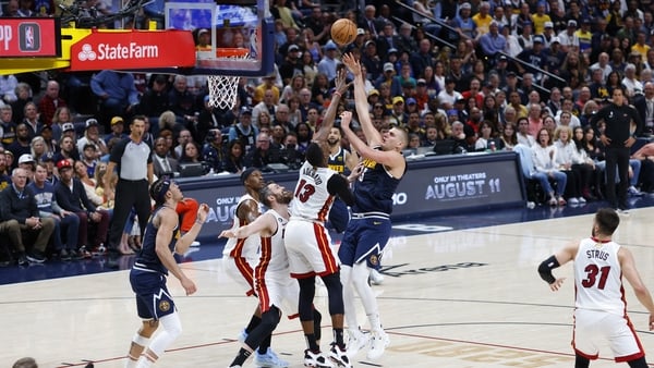 Denver Nuggets centre Nikola Jokic shoots at the basket at Ball Arena
