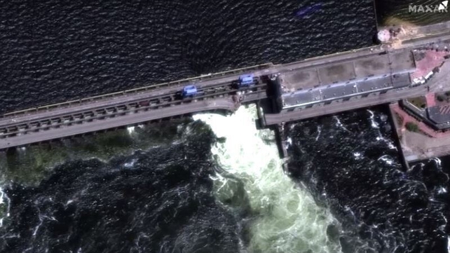 Footage shows water surging through the remains of the dam (Pics: Maxar Technologies)