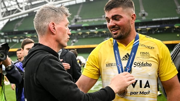 Gregory Alldritt (r) and Ronan O'Gara celebrate after the match
