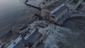 A screengrab captured from a video shows the Kakhovka Hydroelectric Power Plant after the blast (Pic: Zelenskyy Social Media Account)