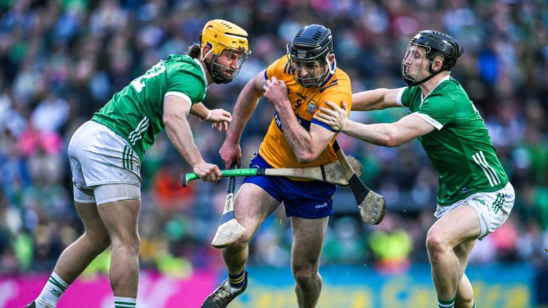 Cathal Malone of Clare in action against Tom Morrissey, left, and Peter Casey of Limerick during their Munster group clash