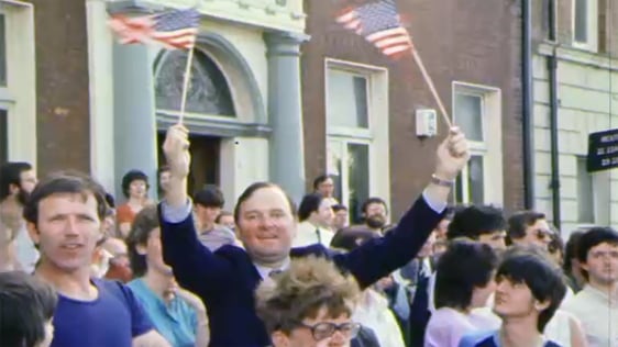 Supporter of US Vice President George Bush outisde the Garden of Remembrance in Dublin, 1983