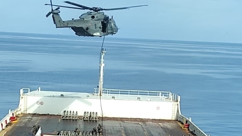 A photo taken by the crew of the Turkish ship "Galata Seaway" shows the Italian special forces launching a rescue operation
