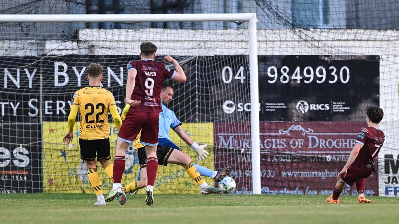 Darragh Markey of Drogheda United shoots to score the winner