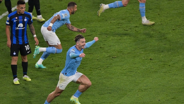 Manchester City's Jack Grealish and Kyle Walker react at the full-time whistle