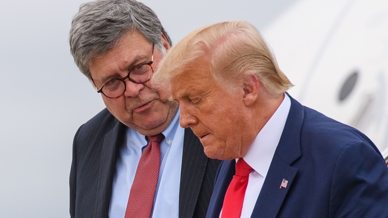 Former US president Donald Trump, right, step off Air Force One with his then Attorney General William Barr in 2020