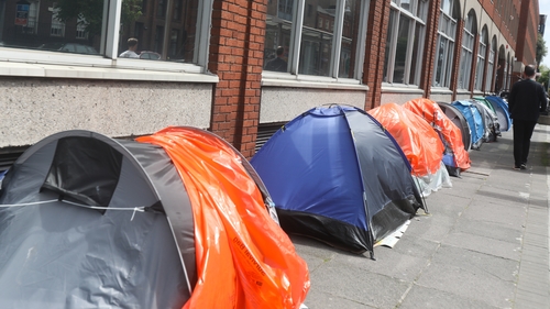 International protection applicants camped outside the International Protection Office in tents last May due to shortages (Pic: RollingNews.ie)
