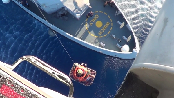 A screengrab of Greek search and rescue operations after a fishing boat crammed with people sank yesterday (Greek Defence Ministry)