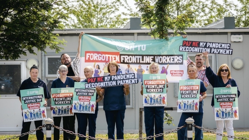 Cleaners at Beaumont Hospital in Dublin take part in a protest over their Covid bonus payment