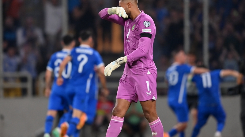Greece celebrate the captain's opening goal