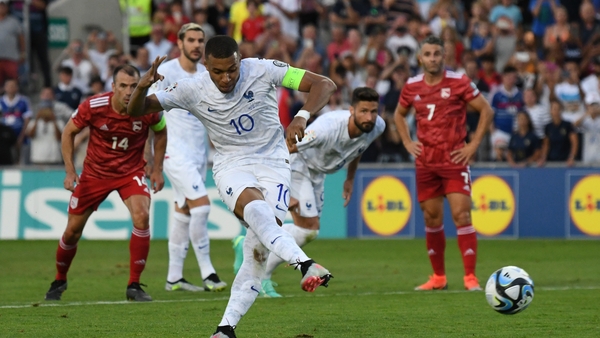Kylian Mbappé scores his sides second goal from a penalty kick