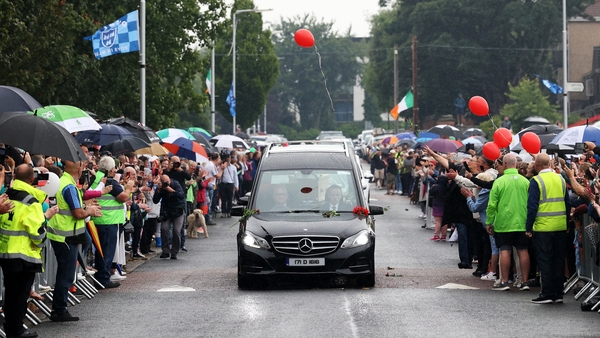 Christy Dignam's funeral cortege makes its way through Finglas / Image: Sam Boal/Rollingnews.ie