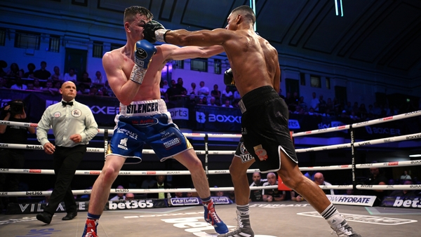 Aaron 'The Silencer' McKenna, left, in action against Uisima Lima at York Hallin London