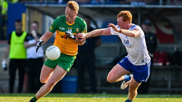 Donegal's Oisin Gallen solos past Monaghan's Ryan O'Toole