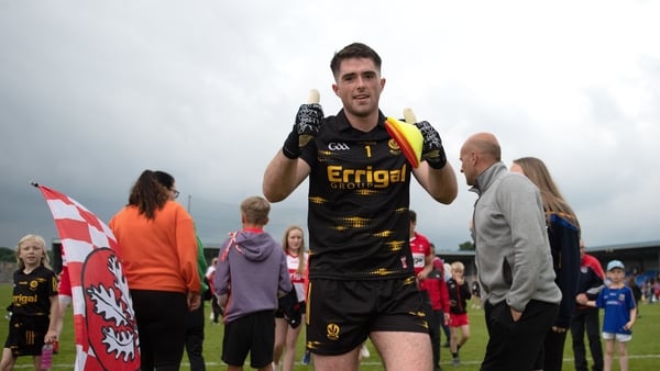 Derry goalkeeper Odhran Lynch, who scored two points from play, celebrates the win over Clare