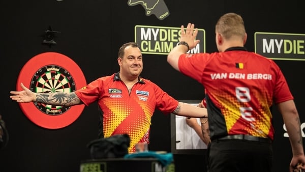 Kim Huybrechts and Dimitri Van den Bergh put their differences aside to knock out the Netherlands. Credit: Jonas Hunold/PDC