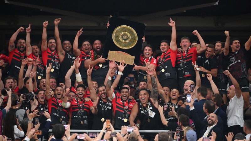 Toulouse players celebrate with the Bouclier de Brennus (Brennus Shield) at the Stade de France