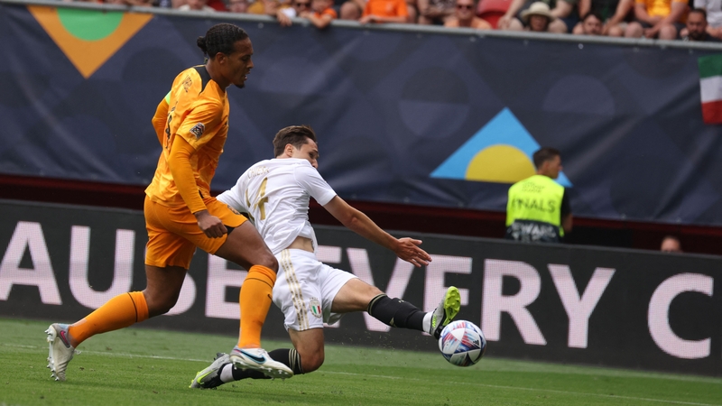 Federico Chiesa (R) guides home Italy's third goal