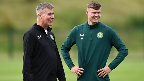 The manager shares a moment with young striker Evan Ferguson