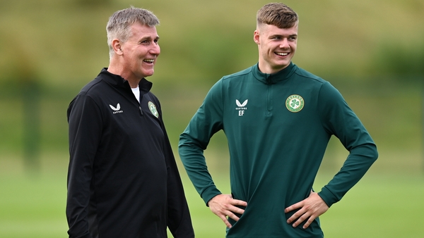 The manager shares a moment with young striker Evan Ferguson