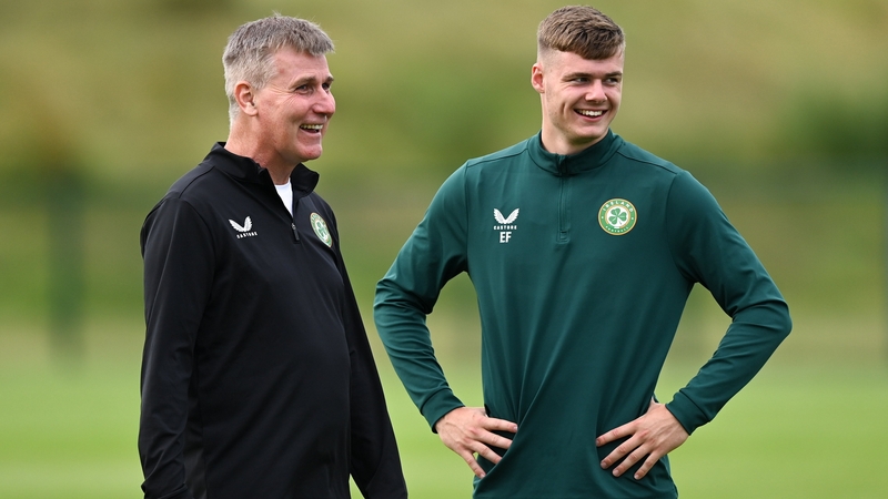 The manager shares a moment with young striker Evan Ferguson