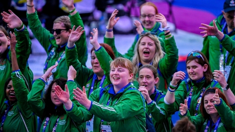 Team Ireland athletes wave to supporters as they arrive into the stadium for the World Special Olympic Games