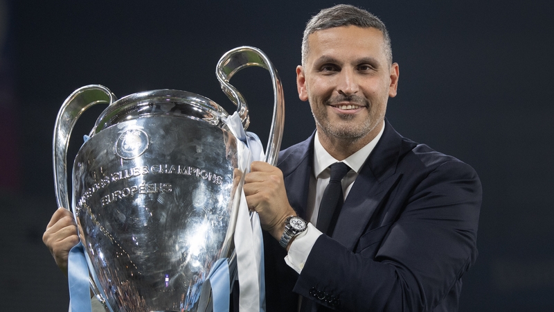 Khaldoon Al Mubarak with the Champions League trophy