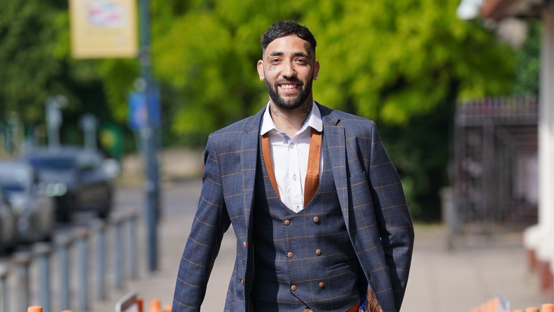 James White arrives at Willesden Magistrates' Court, north west London, where he is charged with displaying threatening or abusive writing likely to cause harassment, alarm or distress