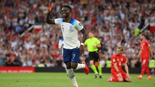 Bukayo Saka celebrates his hat-trick against North Macedonia