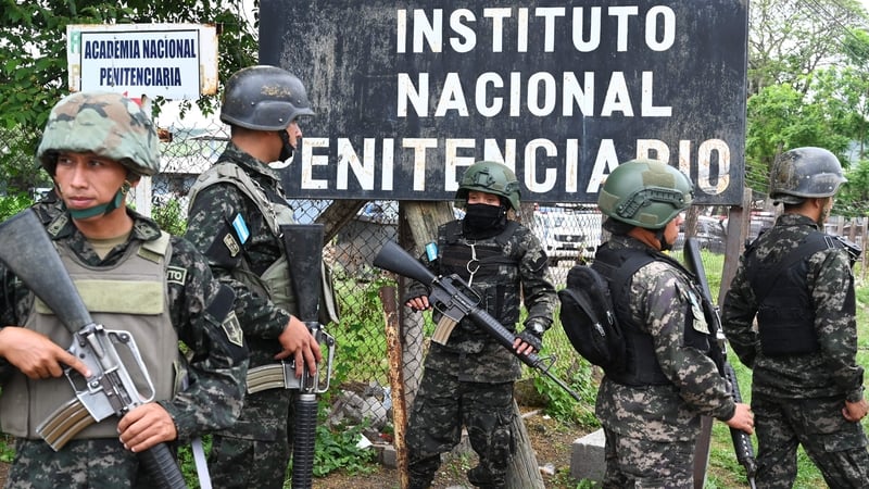 Soldiers guard the facilities of the prison after the fire