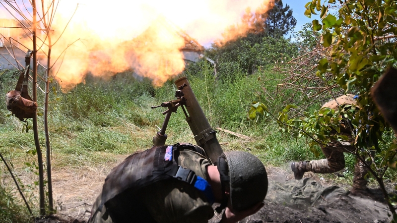 Ukrainian marines of the 35th Brigade fire a 120mm mortar towards Russian positions in a recently liberated Donetsk village