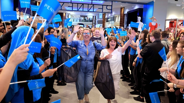 Staff members greeting the first customers at the new Penneys store in Dundrum