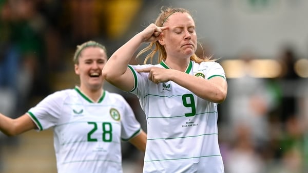 Amber Barrett (R) celebrates her second goal