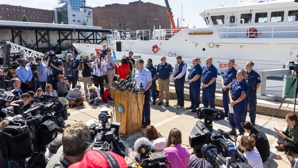 Rear Admiral John Mauger speaks to reporters in Boston to confirm the recovery of debris