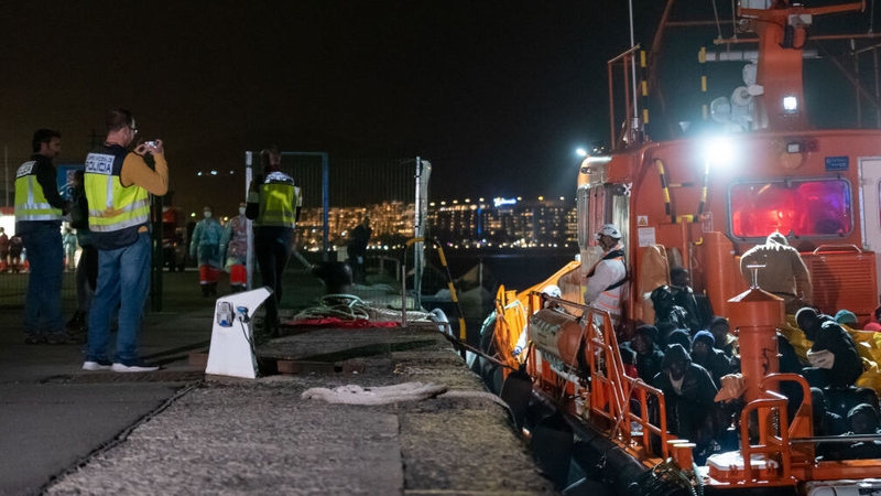 Dozens of rescued migrants arriving at a port in the Canary Islands earlier this year (file pic)