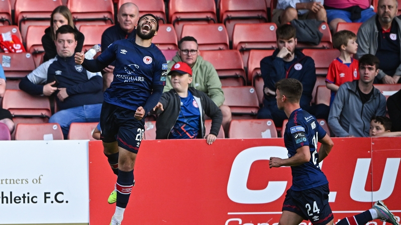 Jake Mulraney celebrates after curling home the winner from a dead ball