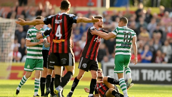 Adam McDonnell and Graham Burke become acquainted during Dublin derby