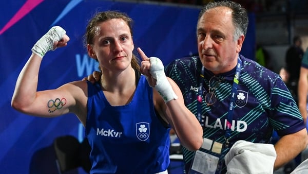Michaela Walsh celebrates after her victory over Aysen Taskin