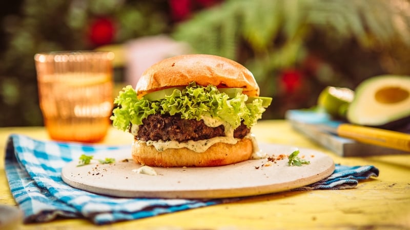 Topped with spicy chipotle mayo and cool avocado, these black bean burgers are perfect for your summer barbecue.