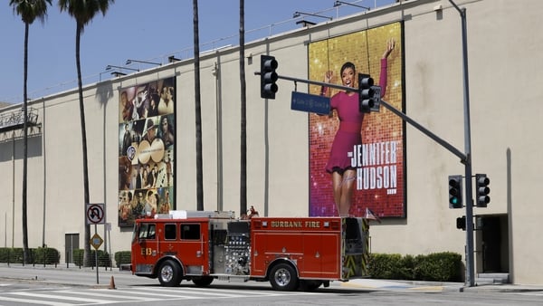 A fire is extinguished at Warner Bros. Studios on 30 June 30 in Burbank, California. The fire was reportedly due to electric equipment and was quickly contained by the Burbank Fire Department. (Photo by Kevin Winter/Getty Images)