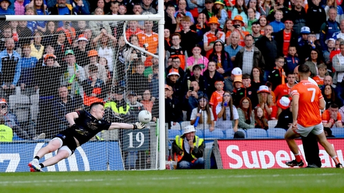 Rory Beggan gets down to his right to save the first penalty from Callum Cumiskey