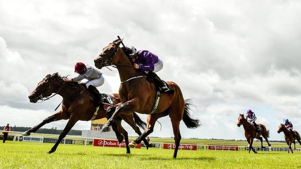 Bucanero Fuerte (near side) gets the better of Unquestionable in the Railway Stakes