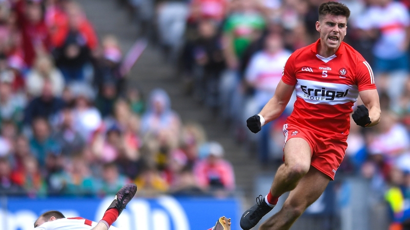 Conor Doherty wheels away to celebrate his goal against Cork