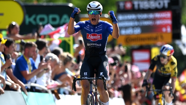 Jasper Philipsen crosses the finish line in the Basque Country