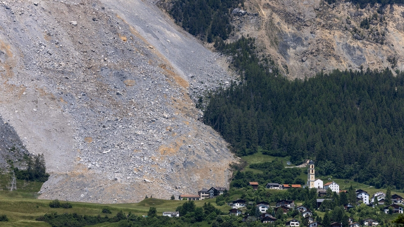 A metre-high wall of mud and rock came to a halt just in front of the village school