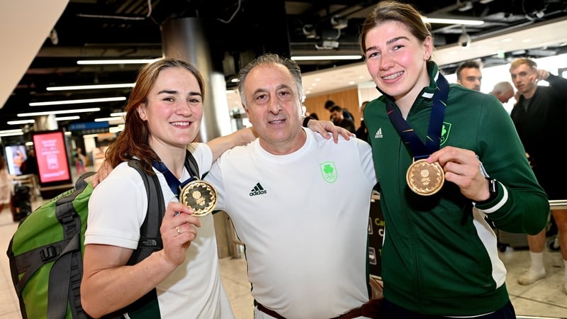 Boxing head coach Zaur Antia, with gold medalists Kellie Harrington, left, and Aoife O'Rourke pictured at Dublin Airport